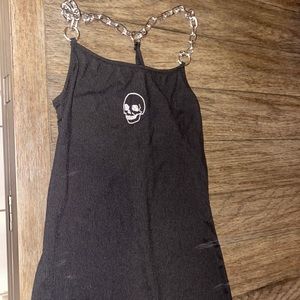 Black dress with a skull and a chain back.